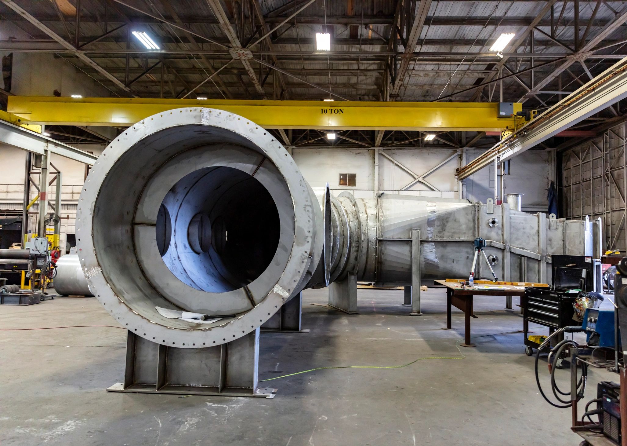Industrial refining facility representing gold smelting and process support